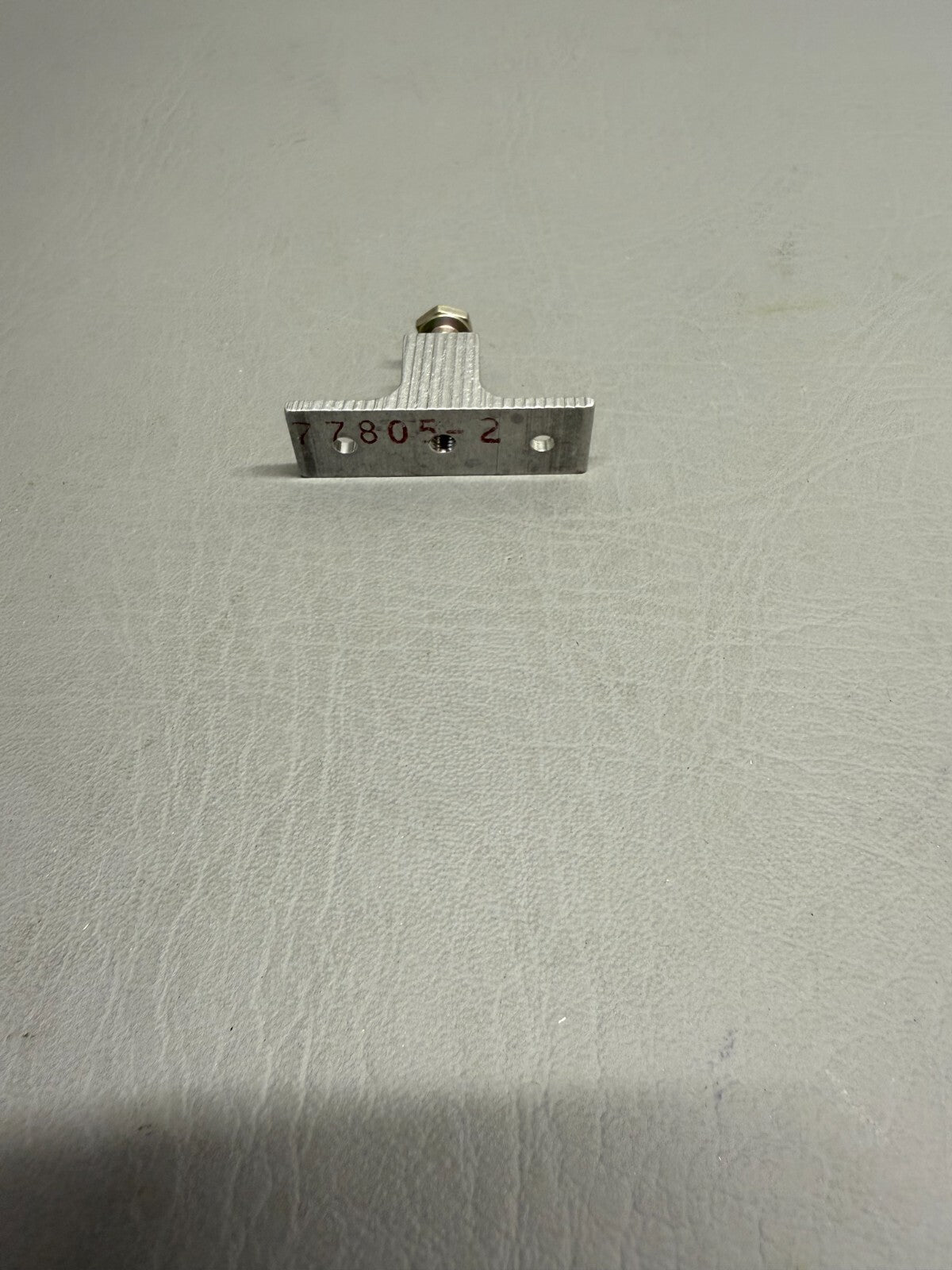 77805-002 Piper Flap Stop